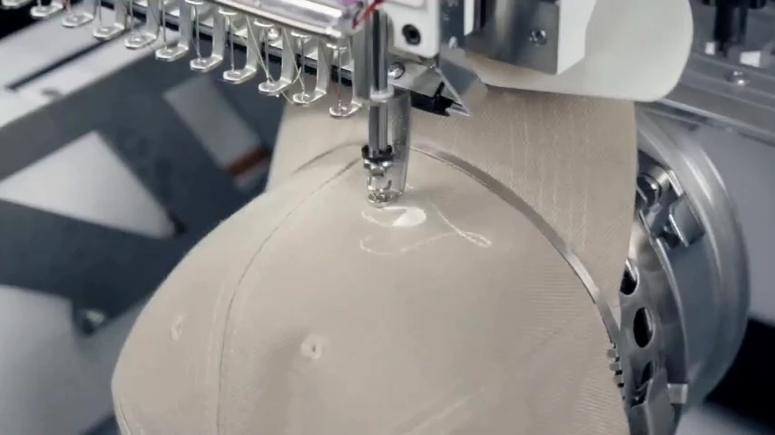 Cap embroidery shown at 00:18 in the supplied 1501 video.