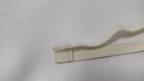 SF-18-3 — Folded cord-end sewing example from the catalogue.